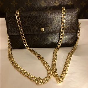 SOLDAuthentic Louis Vuitton Sarah Wallet